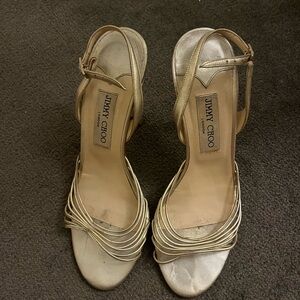 Worn but functional gold Jimmy Choo heels